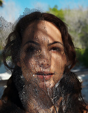 Stacked diva with natural love bubbles shows trimmed twat during vacation on beach