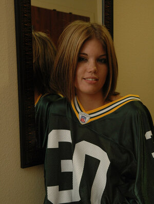 Football fan unclothes and moreover covers pussy using a piece of artificial cheese