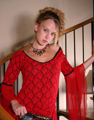 18-19 year old blonde takes off red dress and plus besides panties and plus besides poses hiding her perky jugs