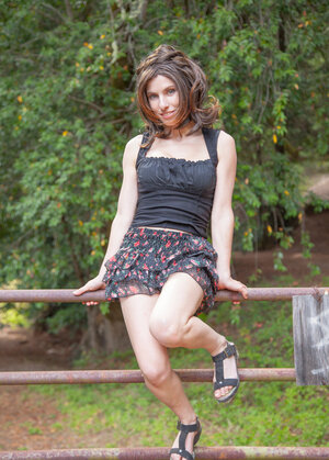 Slender country girl gets topless to locate her fantastic big jugs in the woods