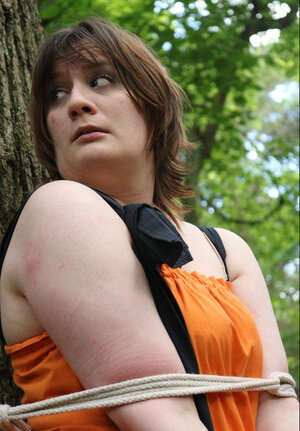 Helpless housewife is captured by lover and also pinioned up to tree in public park