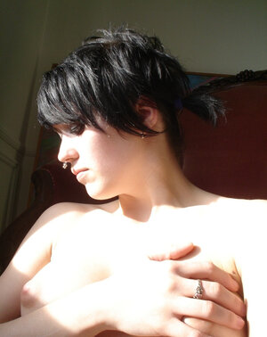Student with a nose ring is so hot that she goes crazy about her own body