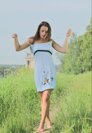 Nice-looking teenage broad exposes her slender body when walking in the naked