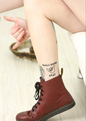 Broad with sexy horns is a really Devil as for striptease by the drapes