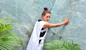 Alluring kitten with a firm booty is going to expose her slit