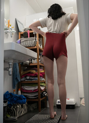 Firm titties brunette girl showing her sexy backside as well