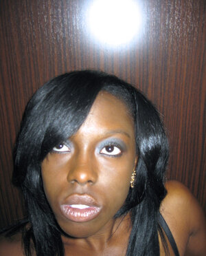 Black bitch Jelly Sweets films her naked body to tease her bf