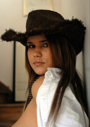 Stacked college chick takes off her sexy outfit to show boobies