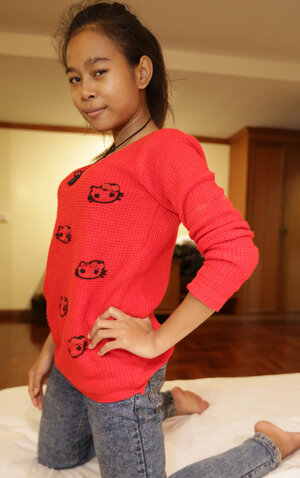 Little Asian is happy to open her pussy for a large UK fuck tool