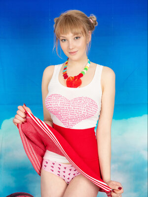 Limona flashes her charming underwear before stripping naked