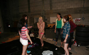 Clothed lesbians have a passionate session with milk sacks and asses