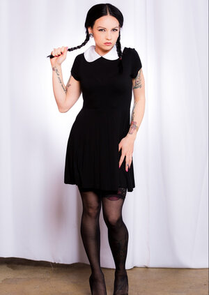 Necro Nikki strips and plus spreads as Wednesday Addams
