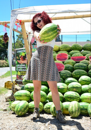 Elisa Odiosa seems to want to get down and dirty a... huge watermelon