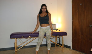 Brunette masseuse gives a handjob with her milk sacks out while topless