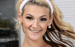 Honey in polka-dot blue dress doesn't feel shy to expose a couple of lovely tattoos