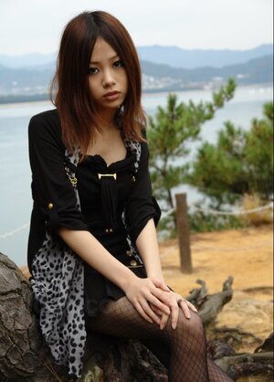 Asiatic broad with sunglasses on looks so seriously cos she is shy being naked