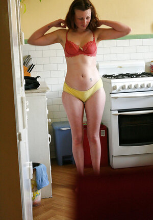 Whorey gets dressed in the kitchen being filmed on a hidden cam