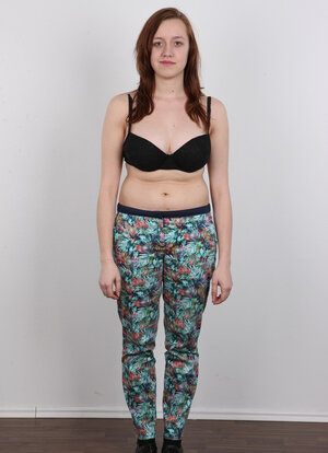 Adore with red hair leaves panties on exposing heavy melons that make her slouch