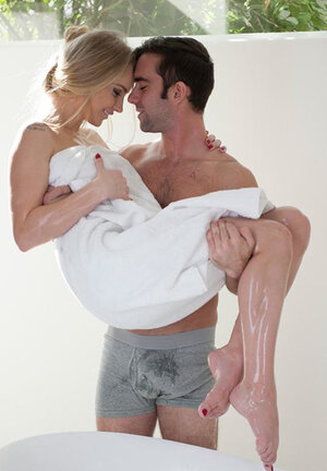 Blonde chick Staci Carr welcomes her lover and they move to sofa for getting down and dirty