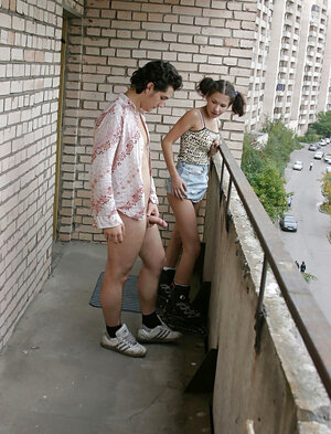 Russian schoolgirl with a duo pigtails lets guy pound her on the public balcony