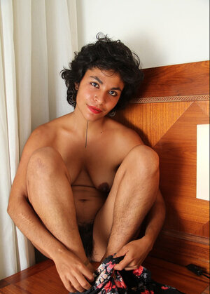 Various diva spreads her unshaved legs wide open to expose unshaved snatch