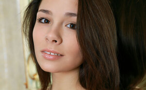 Nymph in underwear unclothes to display her cunt and petite tits by the mirror