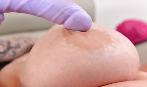 Buxom babe in corset and also stockings Harmony Reigns moans while masturbating