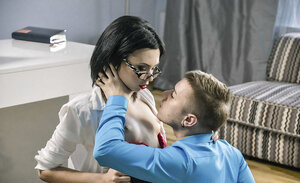 Snazzy chick with glasses and also red lipstick has sex with man on a carpet