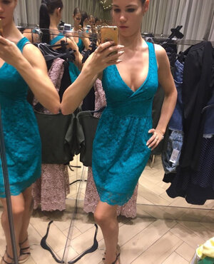 Russian takes picks of flat chest with clothes on and besides without for her man to see