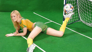 Football gal wears no outfit but just paint on her body in place of uniform